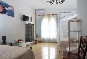 TV a/nebo společenská místnost v ubytování B & B Agrigento antica