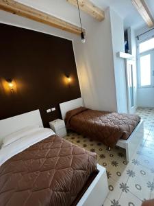 Postel nebo postele na pokoji v ubytování La PortaVecchia - #Home