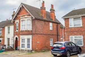 a car parked in front of a brick house at Free Parking-Central Location-Contractor-Leisure in Colchester