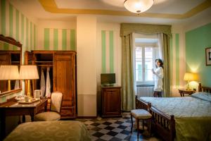 Postel nebo postele na pokoji v ubytování Park Hotel Regina - with air-condition and pool