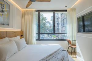 Postel nebo postele na pokoji v ubytování The Arbel Tel Aviv
