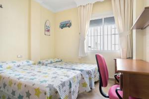 Posteľ alebo postele v izbe v ubytovaní Apartamento El Tajo