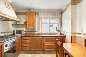 Kuchyňa alebo kuchynka v ubytovaní Apartamento El Tajo