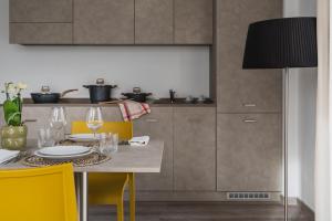 Kuchyň nebo kuchyňský kout v ubytování Nido Suite & Apartments