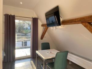 TV a/nebo společenská místnost v ubytování Das Herzchen von Ellenz