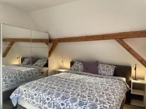 Postel nebo postele na pokoji v ubytování Das Herzchen von Ellenz