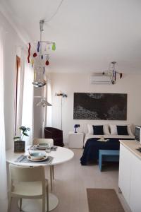 Ένα ή περισσότερα κρεβάτια σε δωμάτιο στο Alto Adriatico Apartments