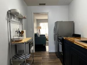 a kitchen with a refrigerator and a counter top at Park View East in Lakeland