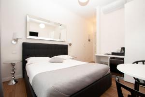 A bed or beds in a room at B&B La finestra sul canale