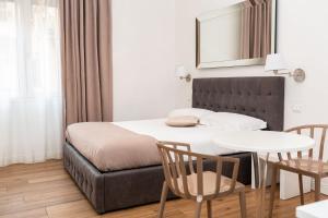 A bed or beds in a room at B&B La finestra sul canale