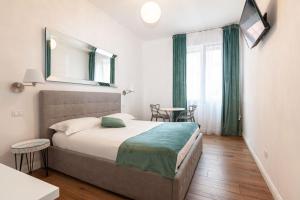 A bed or beds in a room at B&B La finestra sul canale