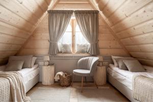 Posteľ alebo postele v izbe v ubytovaní Osada Roztoki - Luxury Chalets