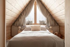 Posteľ alebo postele v izbe v ubytovaní Osada Roztoki - Luxury Chalets