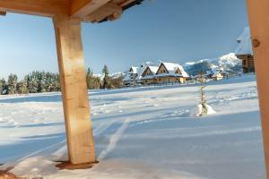Osada Roztoki - Luxury Chalets v zime