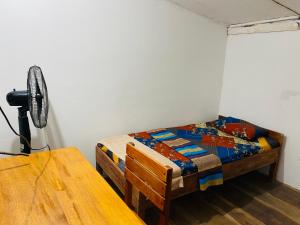 Postel nebo postele na pokoji v ubytování Jama’s Stay