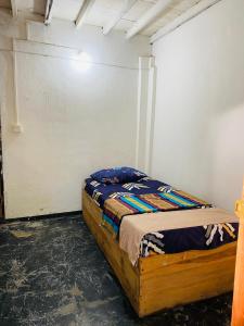 Postel nebo postele na pokoji v ubytování Jama’s Stay