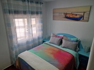 Postel nebo postele na pokoji v ubytování MARODY HOUSE ATICO B