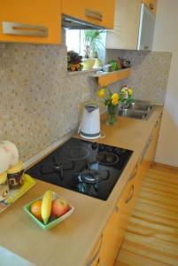 Kuchyňa alebo kuchynka v ubytovaní Apartment Vicko + 37 fotografií