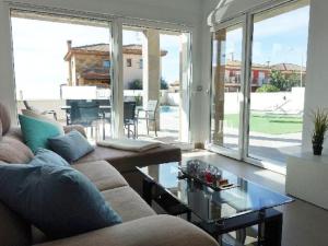 Khu vực ghế ngồi tại Villa Domicil de Luxe