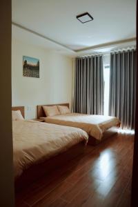Postel nebo postele na pokoji v ubytování Anita homestay Dalat