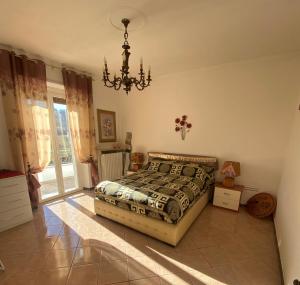 Appartamento suite Raffaella con spettacolare vista panoramica tesisinde bir odada yatak veya yataklar