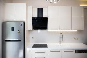 A kitchen or kitchenette at Saint Francis Apartment