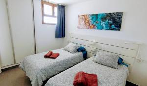 Posteľ alebo postele v izbe v ubytovaní mirador del 6th