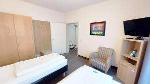 Postel nebo postele na pokoji v ubytování GHOTEL hotel & living Kiel