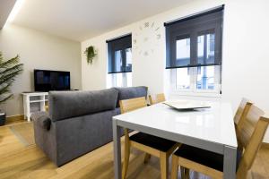 Telewizja i/lub zestaw kina domowego w obiekcie Bakea by Smiling Rentals