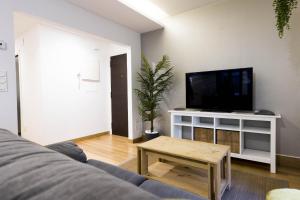 Telewizja i/lub zestaw kina domowego w obiekcie Bakea by Smiling Rentals