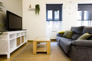 Telewizja i/lub zestaw kina domowego w obiekcie Bakea by Smiling Rentals