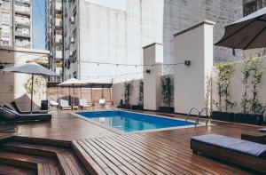 a swimming pool on top of a building at Cyan Américas Towers Hotel in Buenos Aires