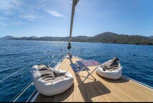 a boat with two bean bags on the water at Hka Neta Yachting in Göcek