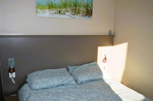 Posteľ alebo postele v izbe v ubytovaní Appt F2 de plain-pied avec terrasse - 2 étoiles