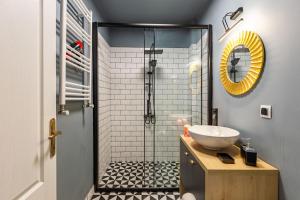 a bathroom with a sink and a shower at Impres in Istanbul