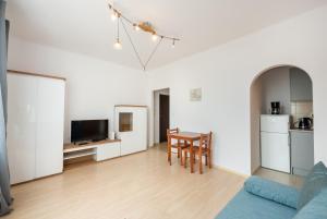Kuchnia lub aneks kuchenny w obiekcie Plac Wilsona Euphony Apartment