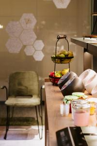 Predel za sedenje v nastanitvi BEE GREEN Linz Self-Check-in-Hotel