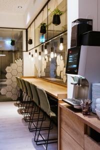 Köök või kööginurk majutusasutuses BEE GREEN Linz Self-Check-in-Hotel