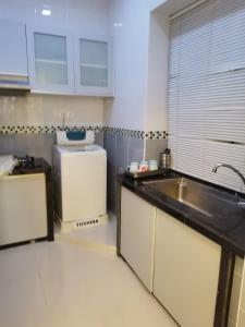 ครัวหรือมุมครัวของ Seri Sayang 2 Apartment suite with 2bedroom