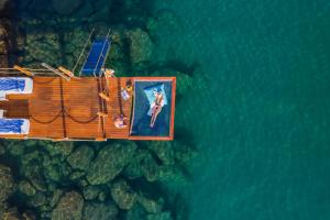 an aerial view of a boat in the water at Rixos Sungate - The Land of Legends Access in Beldibi
