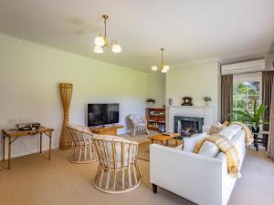 TV a/nebo společenská místnost v ubytování Grand Lodge - Ohakune Holiday Home