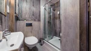Kúpeľňa v ubytovaní Apartamenty Sun & Snow Sanatoryjna - blisko plaży
