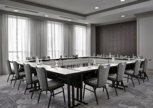 a large conference room with a long table and chairs at Loews New Orleans Hotel in New Orleans +37 photos