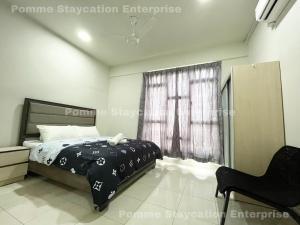 Giường trong phòng chung tại RESIDENSI RUMPUN BAHAGIA