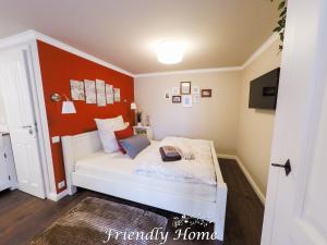 Postel nebo postele na pokoji v ubytování Friendly Home - Doppelappartement "Vitality" Koeln Bonn Phantasialand