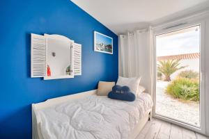 Posteľ alebo postele v izbe v ubytovaní Maison pour 9 - Jacuzzi - 300m de la plage