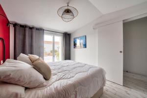 Posteľ alebo postele v izbe v ubytovaní Maison pour 9 - Jacuzzi - 300m de la plage