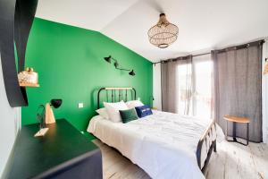 Posteľ alebo postele v izbe v ubytovaní Maison pour 9 - Jacuzzi - 300m de la plage