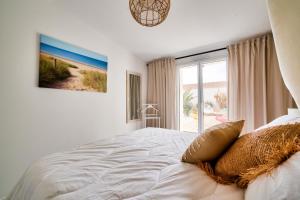 Posteľ alebo postele v izbe v ubytovaní Maison pour 9 - Jacuzzi - 300m de la plage