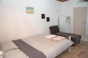Postel nebo postele na pokoji v ubytování Safe and cozy studio in Xanthi!